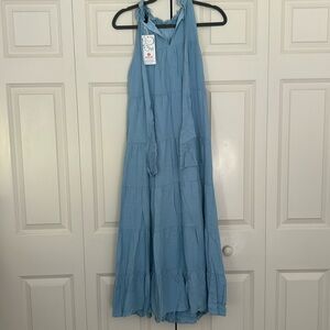 blue maxi dress never worn still has tags, high neck and ties in the back